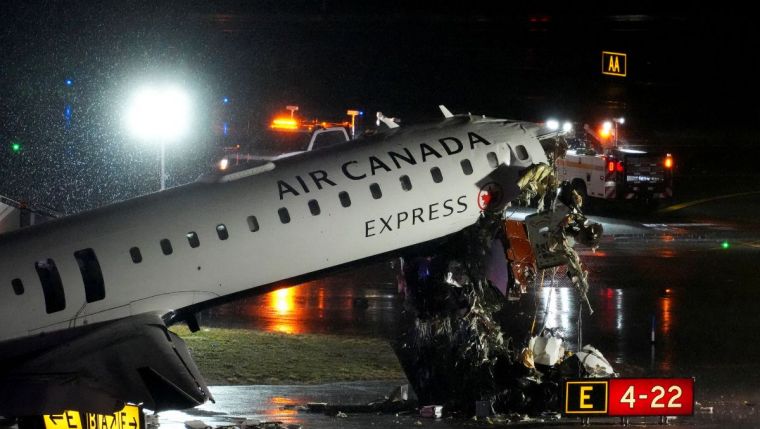 Two Pilots Killed After Air Canada Express Plane Collides with Fire Truck at New York’s LaGuardia Airport
